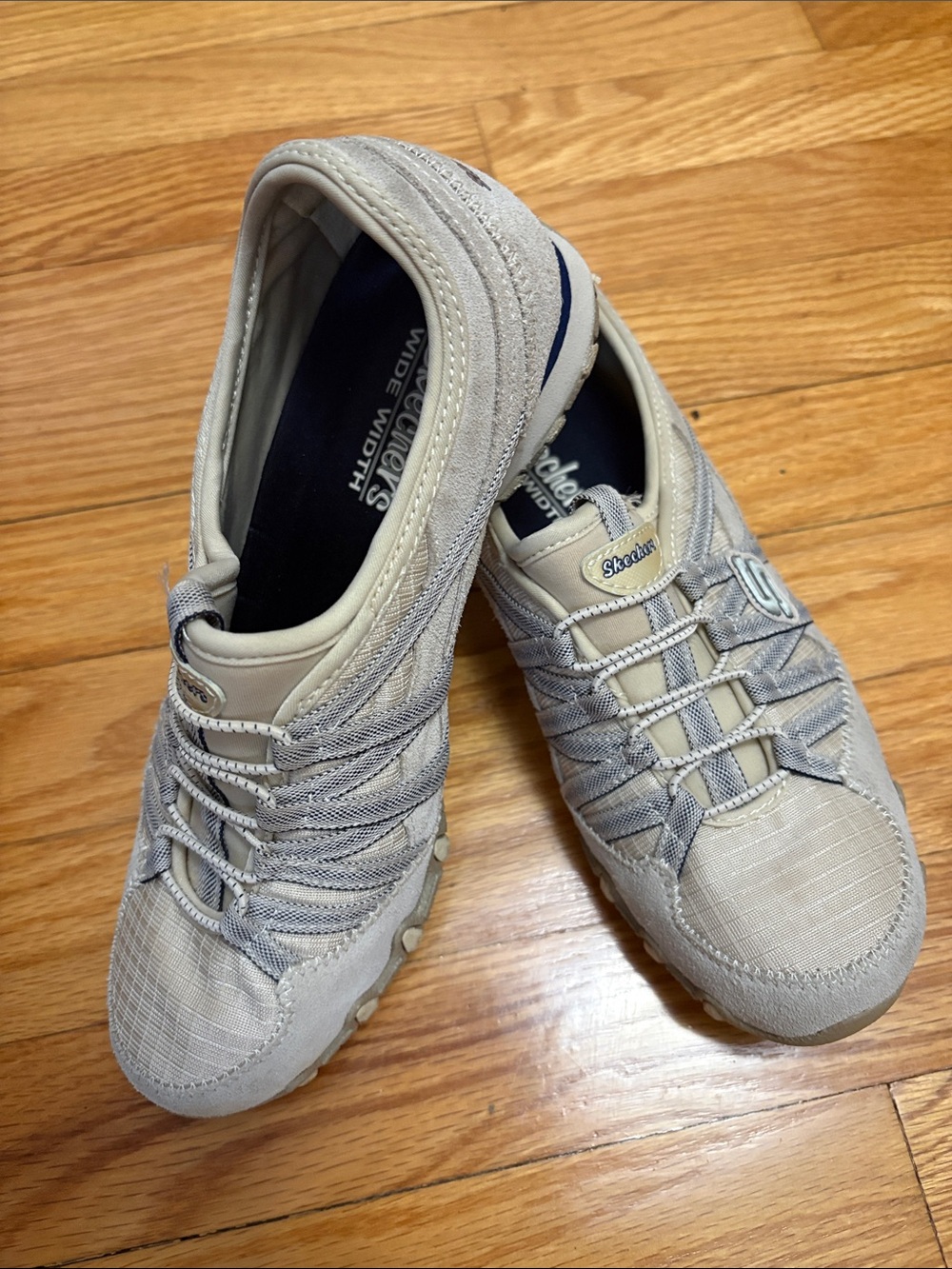 Skechers women’s Light Gray and Beige Slip-On Athletic Sneakers